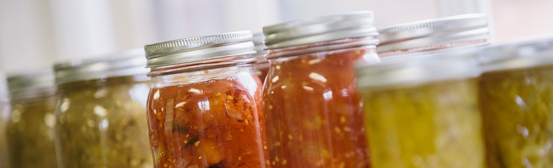 Mason jars lined up in a row