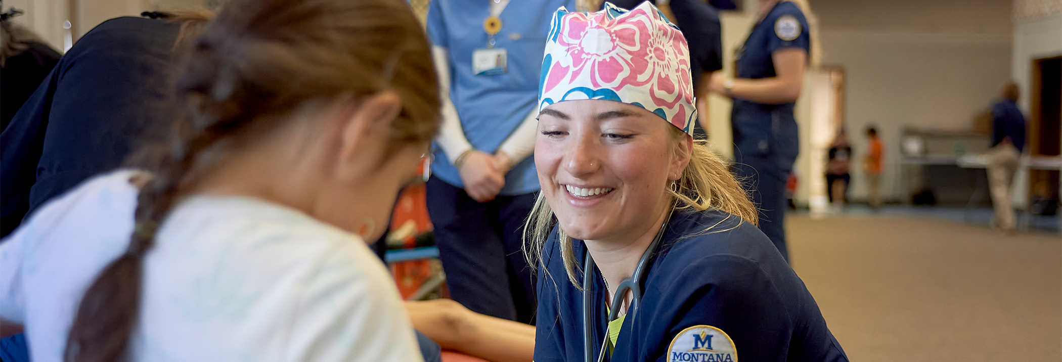 nurse talking to a young child