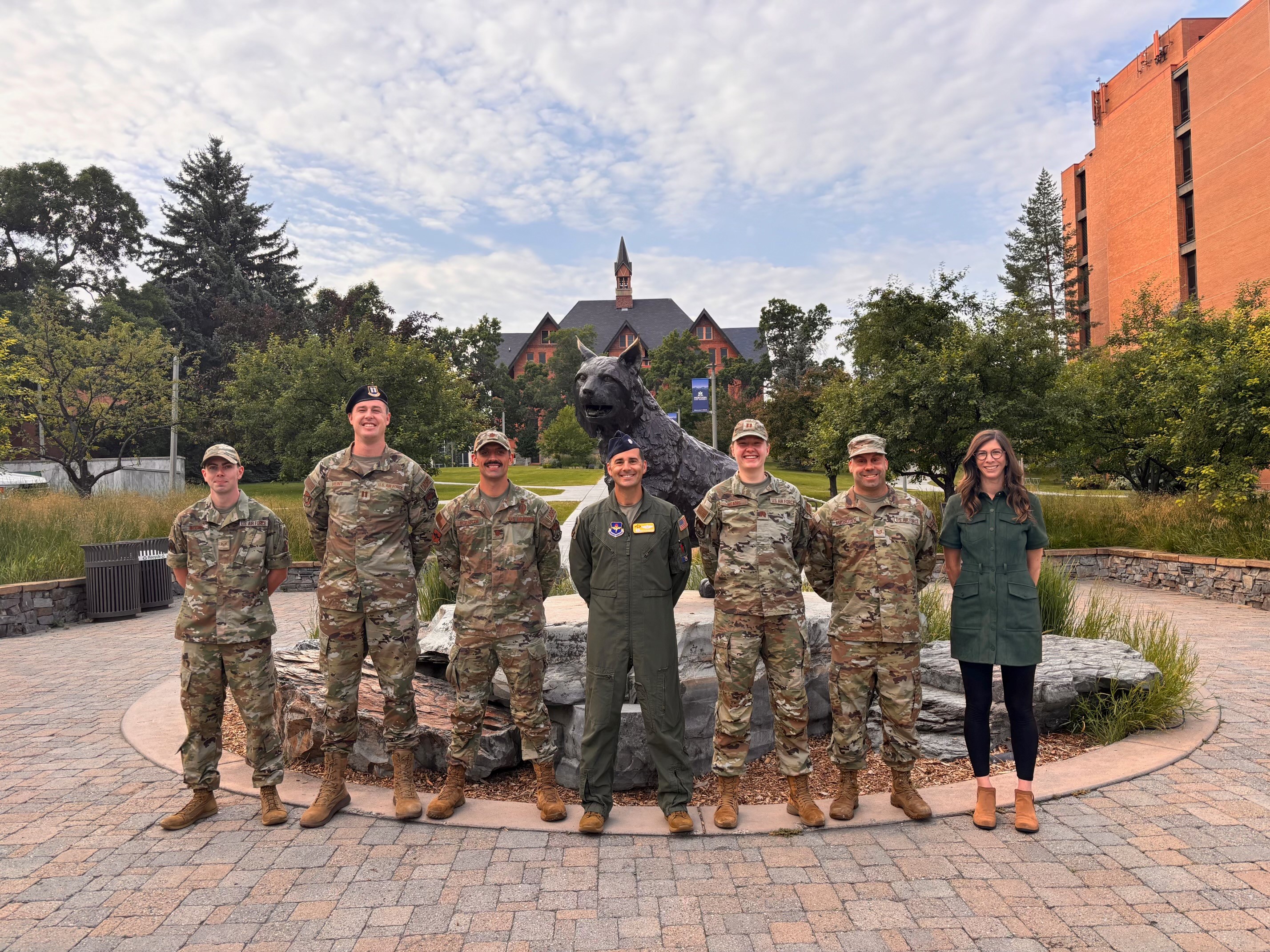 AFROTC Det 450 Cadre AFROTC Det 450 Cadre members in uniform standing in front of the Bobcat Statue at Montana State University
