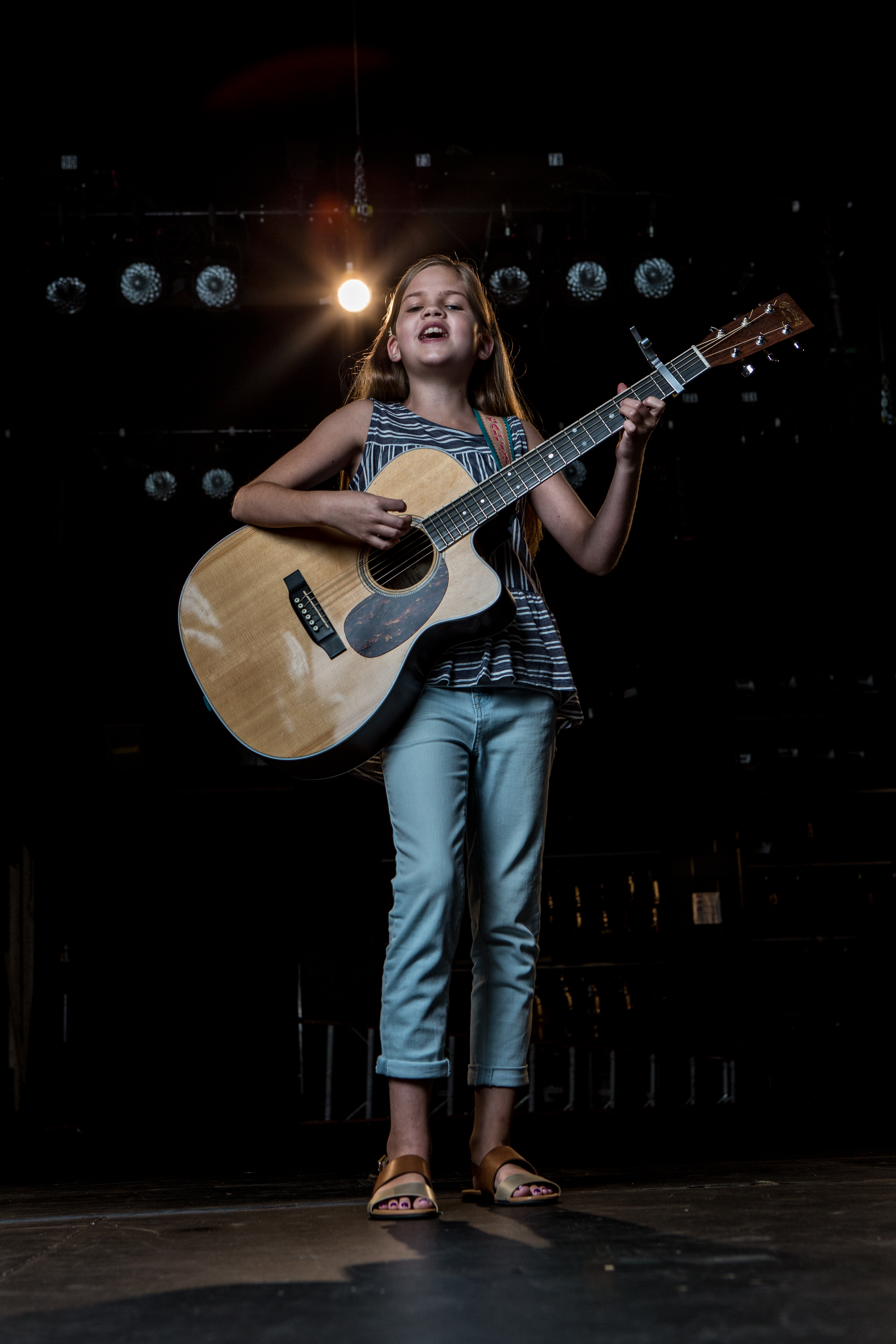 girl plays guitar