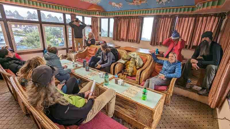 The group waits to depart from Lukla