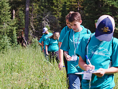 Youth walking in a field