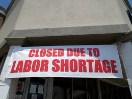 closed sign saying closed due to labor shortage