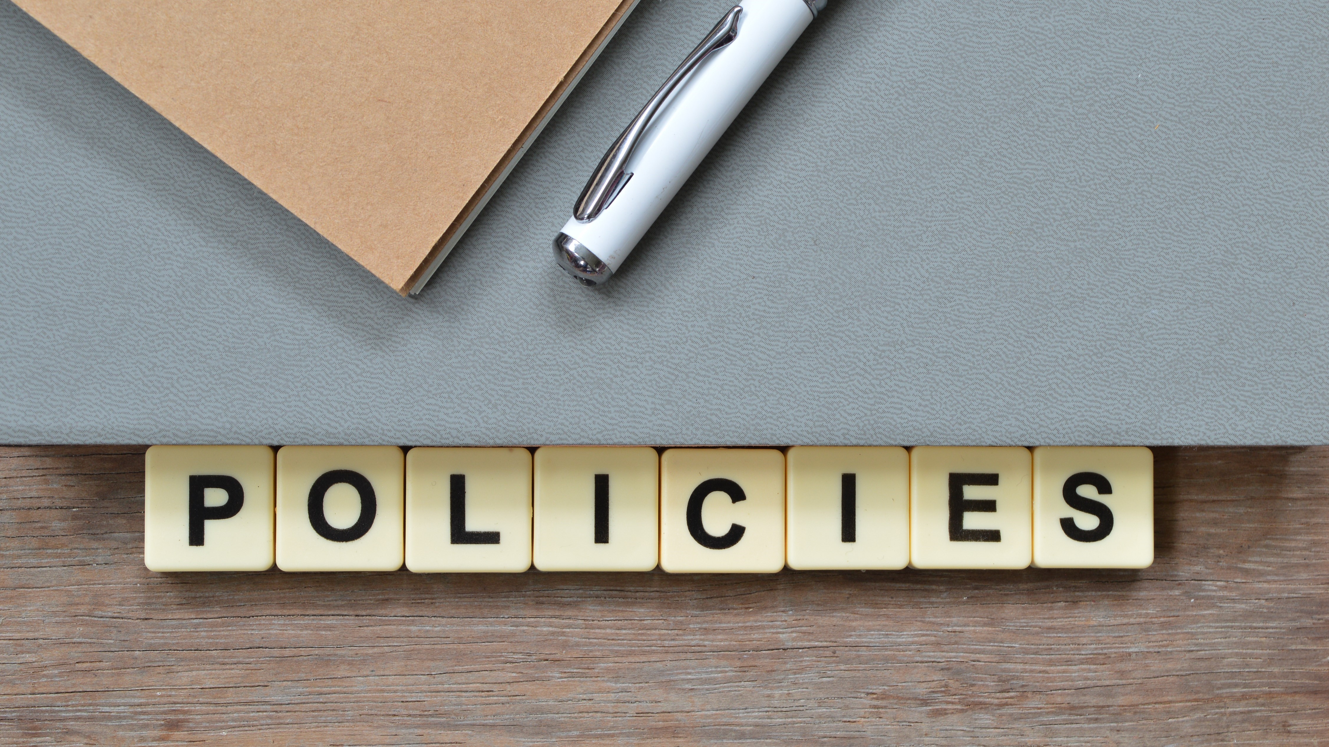 tiles that spell policies