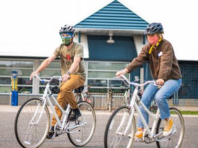 ORP employees ride rental bikes