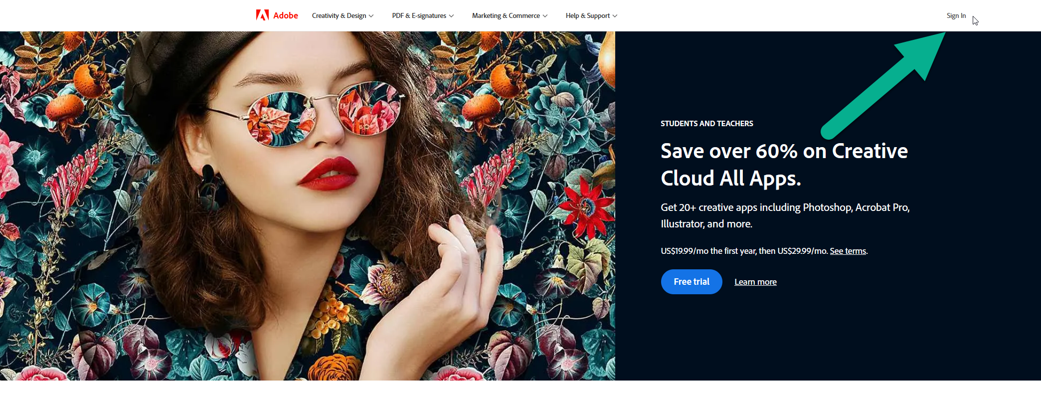 adobe.com main page with an arrow pointing towards the sign in button.